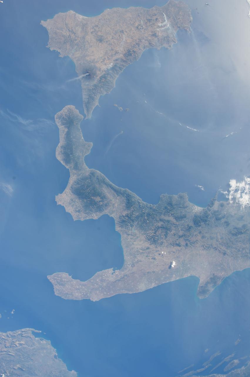 ISS040-E-092470 (13 Aug. 2014) --- One of the Expedition 40 crew members aboard the International Space Station, flying 225 nautical miles above Earth, recorded this image over southern Italy on Aug. 13, 2014. South is on the left side of the picture. Italy's "boot" and Sicily are featured in the 28mm image.