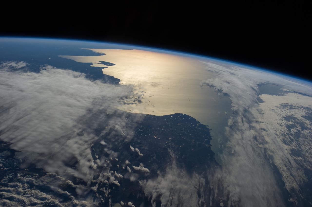 Earth Observation taken during a day pass by the Expedition 40 crew aboard the International Space Station (ISS). Folder lists this as: sun glint near Argentina.