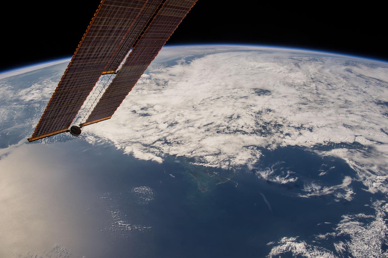 Earth observation taken during a day pass by the Expedition 40 crew aboard the International Space Station (ISS). Part of a solar array is visible.