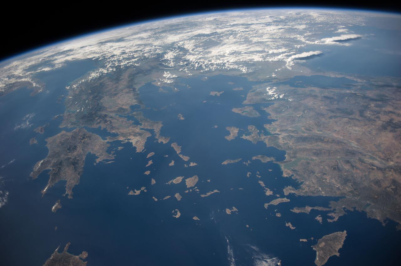 ISS040-E-098804 (16  Aug. 2014) --- One of the Expedition 40 crew members aboard the International Space Station, flying at an altitude of 221 nautical miles, photographed this oblique image showing parts of the continents of Europe and Asia.  Much of Greece is visible on the left side of the frame and a large area of Turkey can be seen at right.