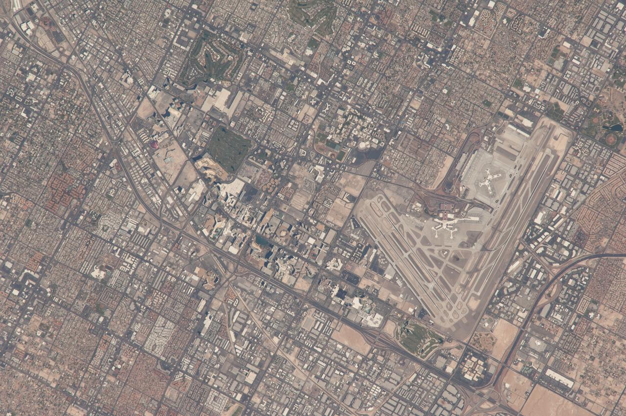 ISS040-E-104966 (23 Aug. 2014) --- One of the Expedition 40 crew members aboard the International Space Station used an 800mm focal length to photograph this detailed image featuring a nadir view of the Las Vegas "Strip" and McCarron International Airport on Aug. 23, 2014.