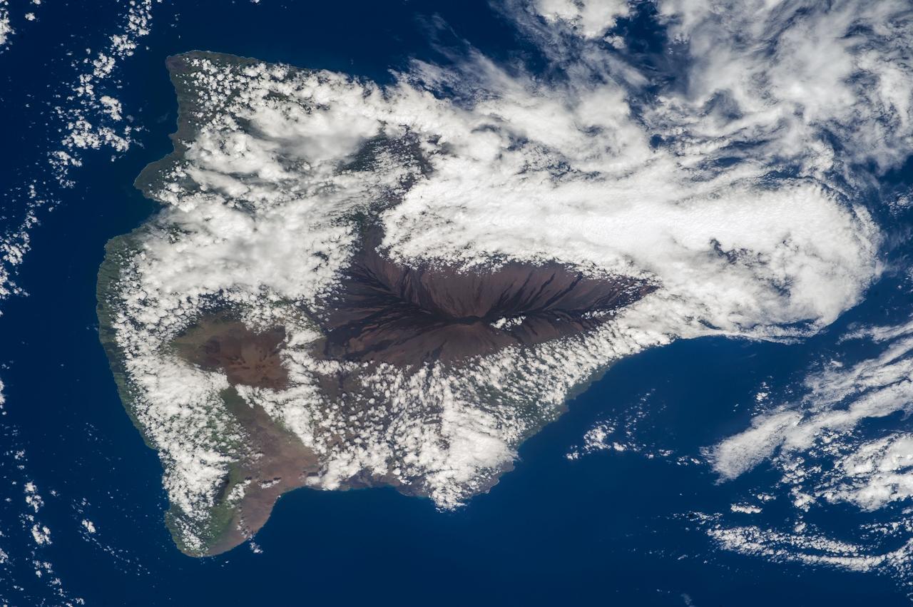 ISS040-E-105653 (24 Aug. 2014) --- One of the Expedition 40 crew members aboard the International Space Station photographed this image of a cloud-covered Big Island of Hawaii on Aug. 24, 2014.