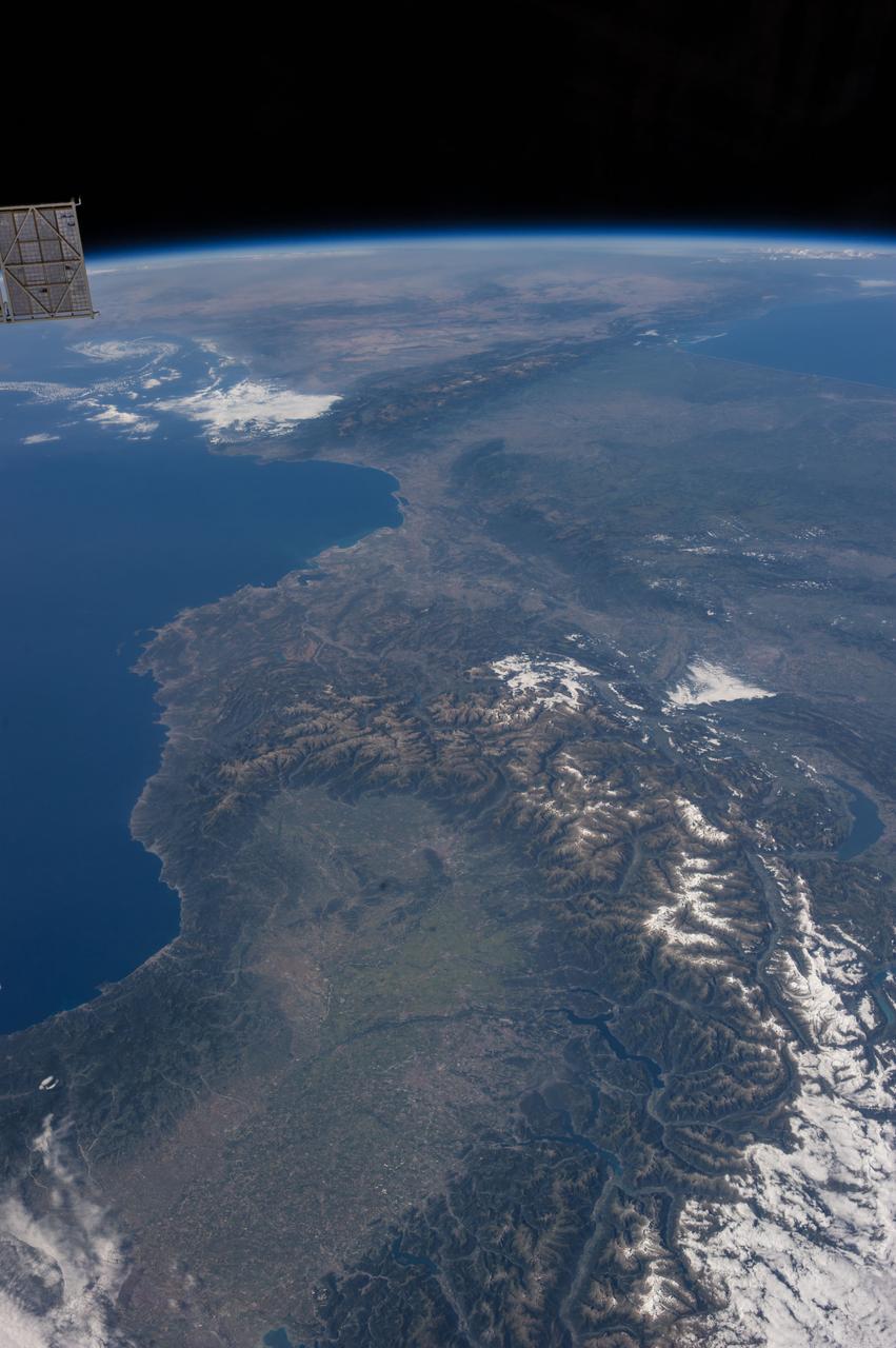 Earth Observation taken during a day pass by the Expedition 40 crew aboard the International Space Station (ISS). On crewmember's Flickr page - From Spain to Italy in a single glimpse.