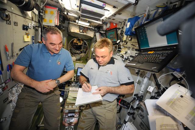 NASA image: Signing ISS RS Handover Protocol
