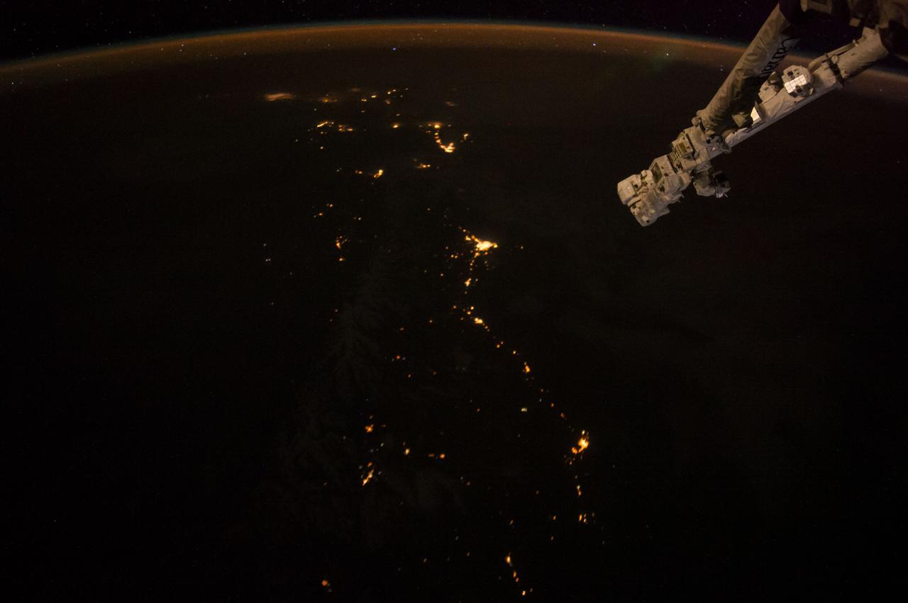 Earth Observation taken during a night pass by the Expedition 40 crew aboard the International Space Station (ISS). Folder lists this as: New Zealand night pass.