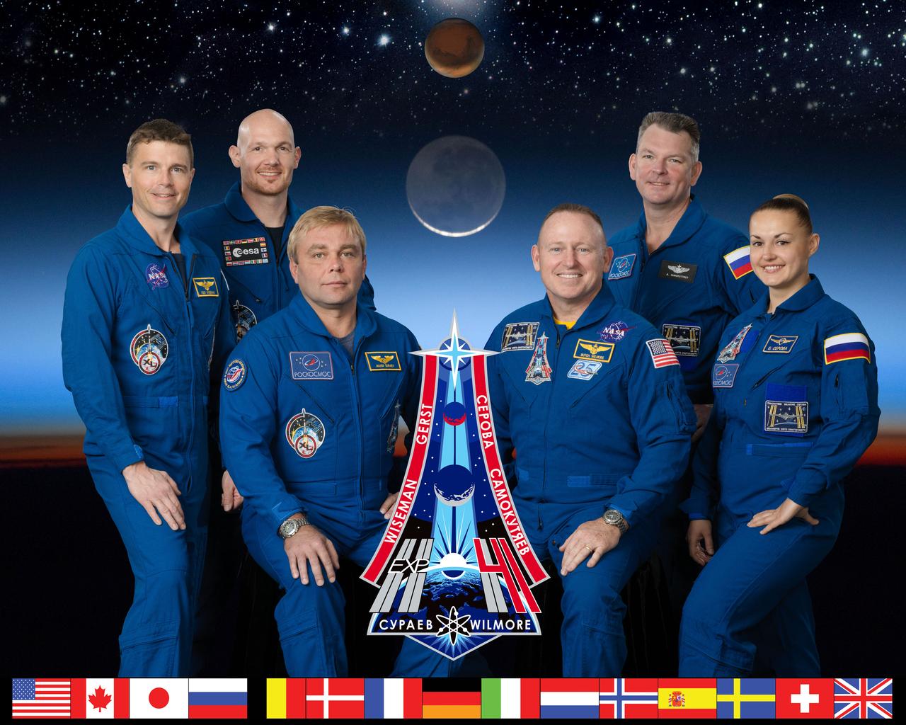 PHOTO DATE: 01-21-14 LOCATION: Bldg. 8, Room 183 - Photo Studio SUBJECT: Expedition 41 official crew portrait. Soyuz 39S Crew: Maxim Suraev, Alexander Gerst, Reid Wiseman and Soyuz 40S crew: Barry Wilmore, Yelena Serova, Alexander Samokutyaye. PHOTOGRAPHER: BILL STAFFORD AND JAMES BLAIR