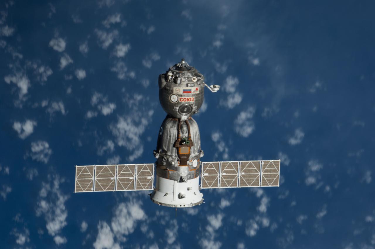 ISS041-E-000017 (10 Sept. 2014) --- The Soyuz TMA-12M spacecraft departs from the International Space Station and heads toward a landing in a remote area near the town of Zhezkazgan, Kazakhstan. NASA astronaut Steve Swanson, Expedition 40 commander; Russian cosmonaut Alexander Skvortsov, Soyuz commander and flight engineer; and Russian cosmonaut Oleg Artemyev, flight engineer, are returning from more than five months aboard the space station where they served as members of the Expedition 39 and 40 crews. Landing occurred at 10:23 p.m. (EDT), Sept. 10, 2014 (8:23 a.m., Sept. 11, Kazakh time).