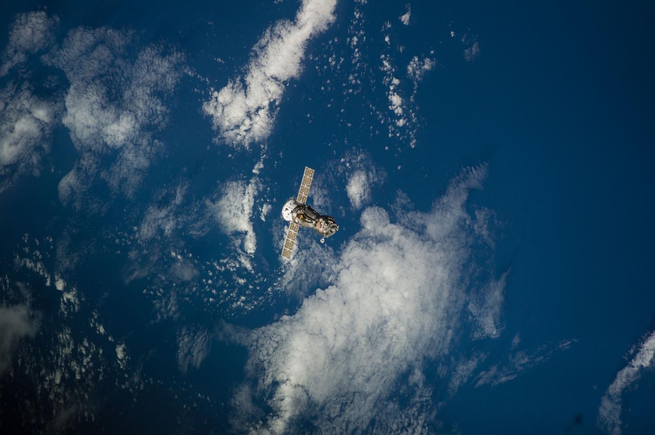 ISS041-E-000044 (10 Sept. 2014) --- The Soyuz TMA-12M spacecraft departs from the International Space Station and heads toward a landing in a remote area near the town of Zhezkazgan, Kazakhstan. NASA astronaut Steve Swanson, Expedition 40 commander; Russian cosmonaut Alexander Skvortsov, Soyuz commander and flight engineer; and Russian cosmonaut Oleg Artemyev, flight engineer, are returning from more than five months aboard the space station where they served as members of the Expedition 39 and 40 crews. Landing occurred at 10:23 p.m. (EDT), Sept. 10, 2014 (8:23 a.m., Sept. 11, Kazakh time).