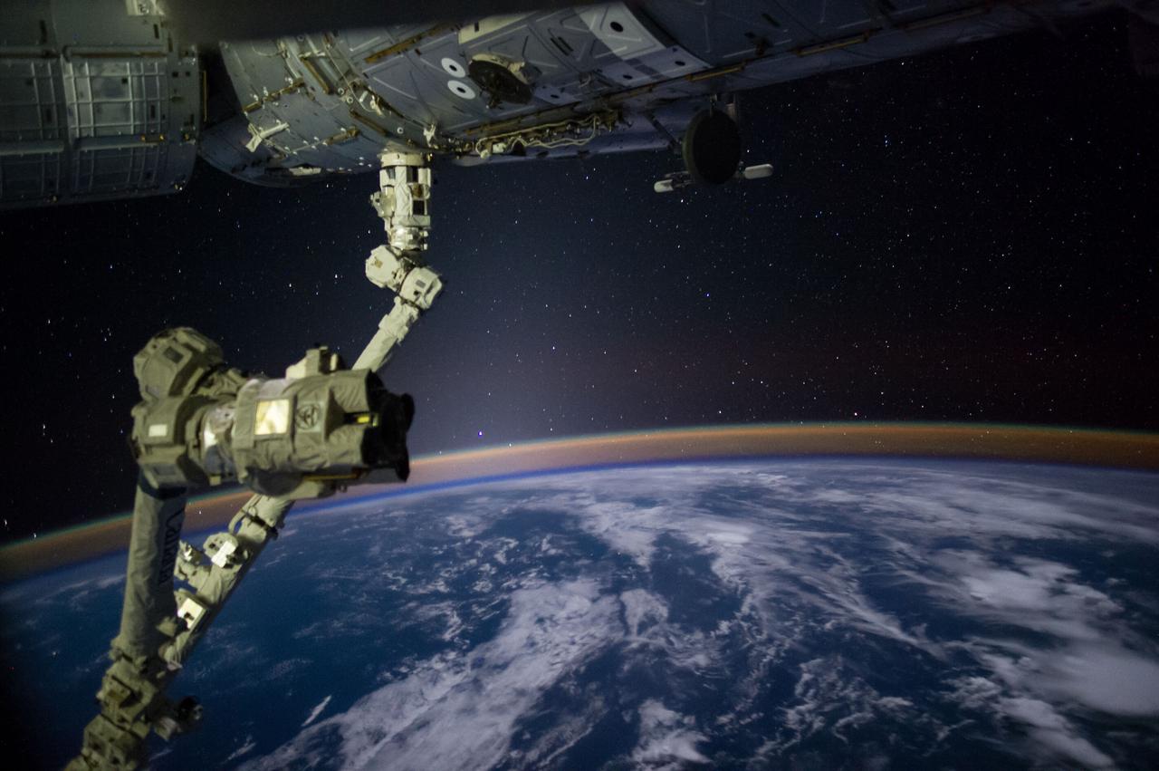 Earth Observations taken by Expedition 41 crewmember. Columbus Module, Node 2, U.S. Laboratory, and Remote Manipulator System (RMS) are visible. One of a series of time lapse photos.