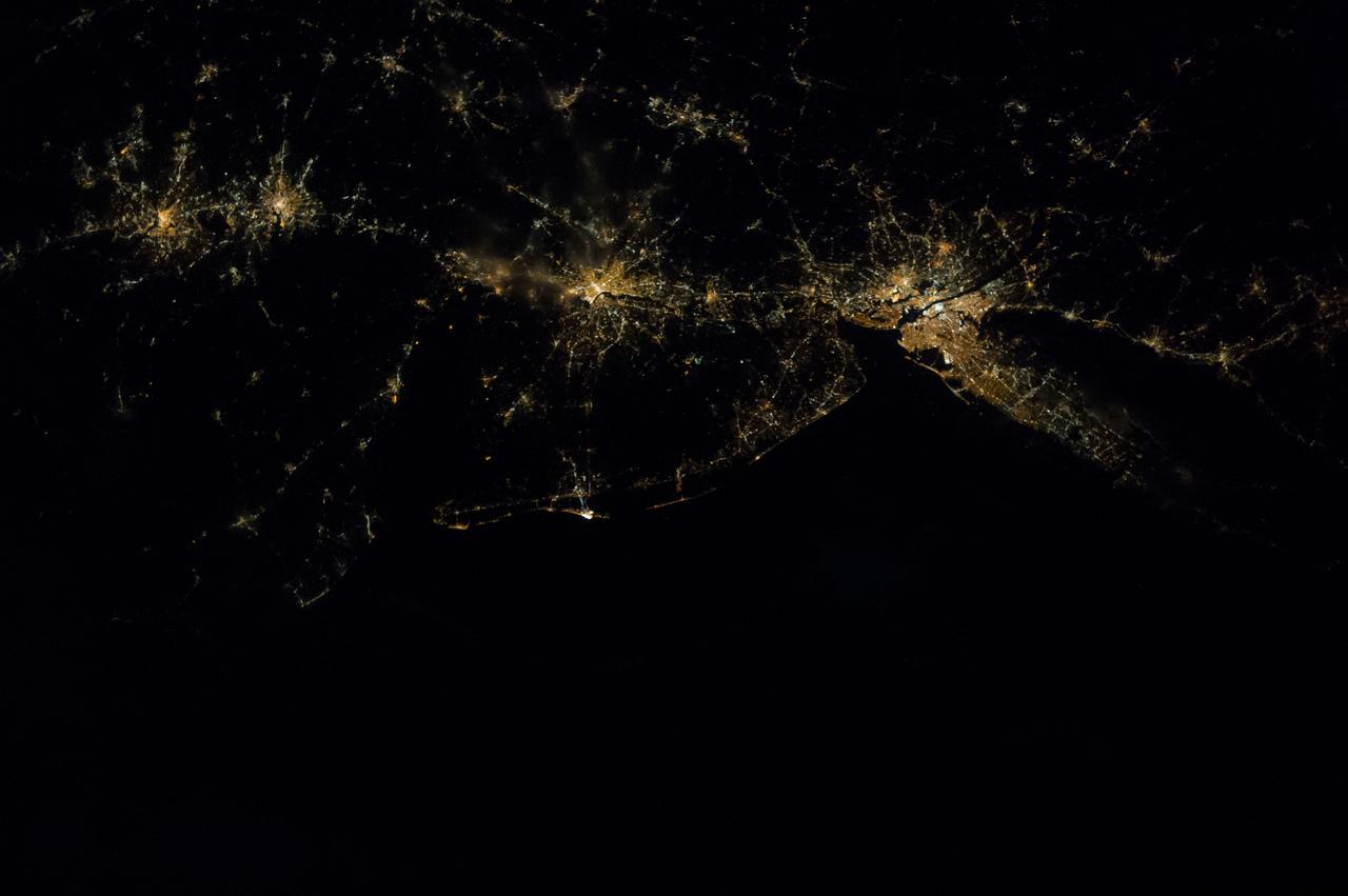 ISS041-E-016740 (17 Sept. 2014) --- One of the Expedition 41 crew members aboard the Earth-orbiting International Space Station exposed this Sept. 17 nocturnal scene featuring most of the largest cities on the central eastern seaboard. Even at 221 nautical miles above Earth, the 28mm focal length on the still camera was able to pick up detail in the image, for example, Central Park on Manhattan at right frame. The nation?s capital is very near frame center.