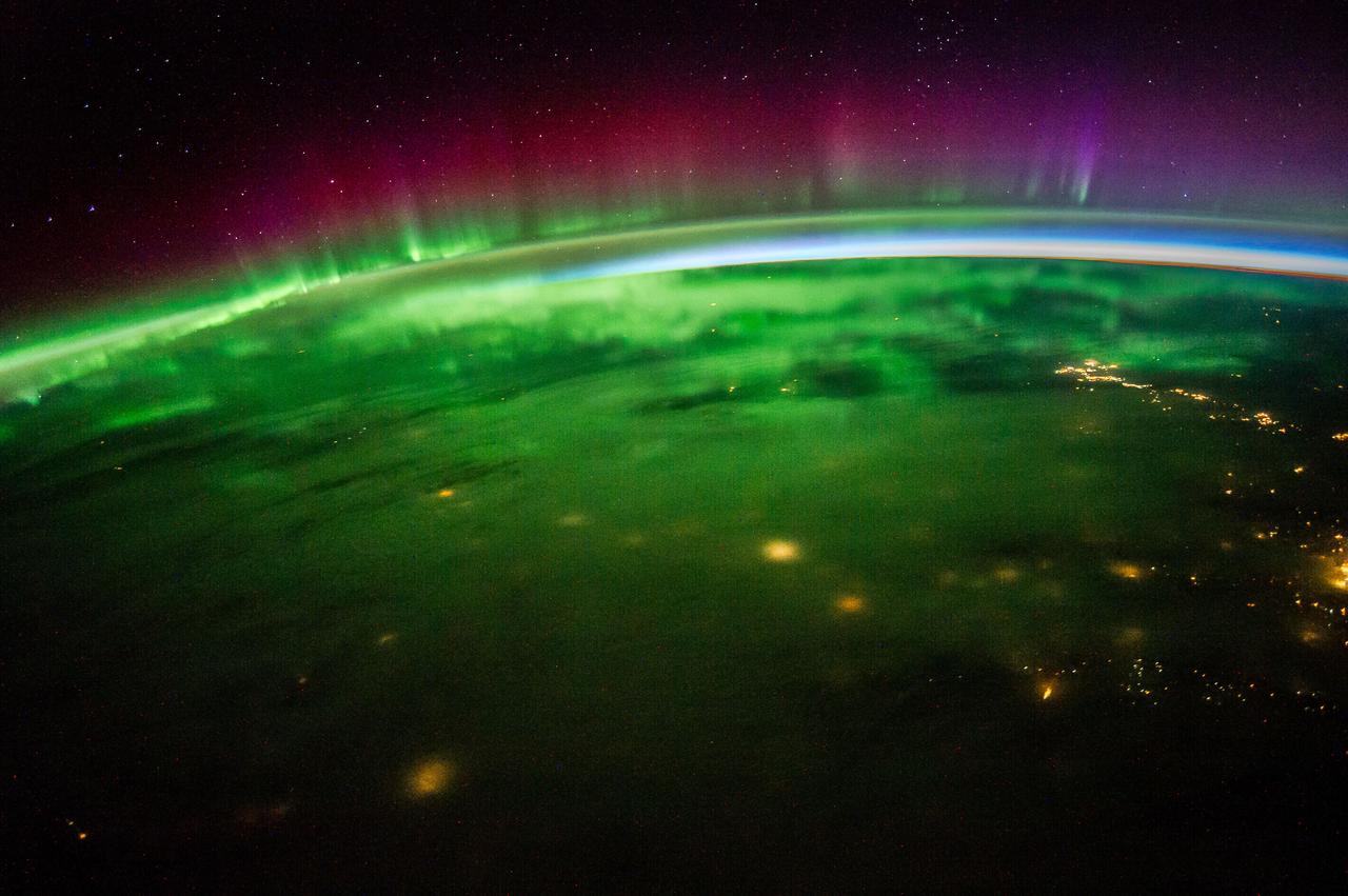 Earth Observations taken by Expedition 41 crewmember. Aurora and sunrise are visible. One of a series of time lapse photos.