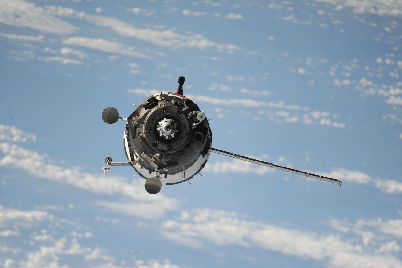ISS041-E-035041 (25 Sept. 2014) --- The Soyuz TMA-14M spacecraft approaches the International Space Station, carrying Expedition 41 Soyuz Commander Alexander Samokutyaev, NASA Flight Engineer Barry Wilmore and Russian Flight Engineer Elena Serova. The Soyuz safely ferried the trio to the station’s Poisk Mini-Research Module 2 (MRM2) despite a port solar array that wouldn’t deploy until after its docking on Sept. 25, 2014.