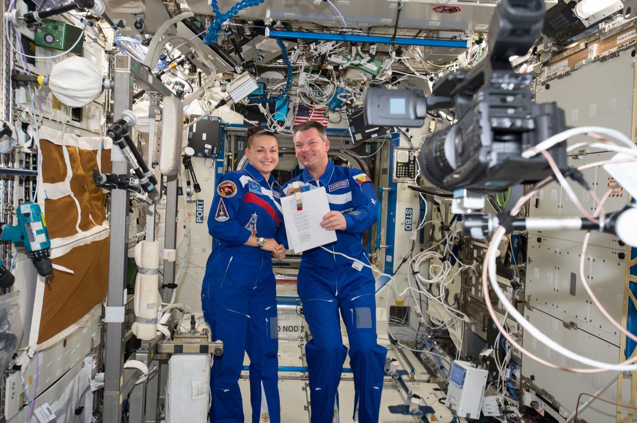 iss042e000043  (11/12/2014) --- Russian cosmonauts Elena Serova and Alexander Samoukutyaev during a broadcast interview abosrd the International Space Station.