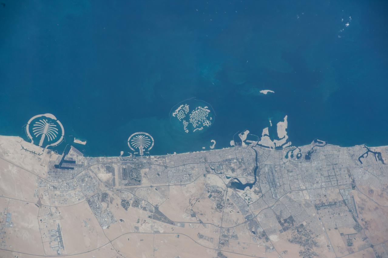 ISS042E006751 (11/08/2014) --- Earth observation taken from the International Space Station of the coastline of the United Arab Emirates. The large wheel along the coast center left is "Jumeirah" Palm Island, with a conference center, hotels, recreation areas and a large marine zoo.