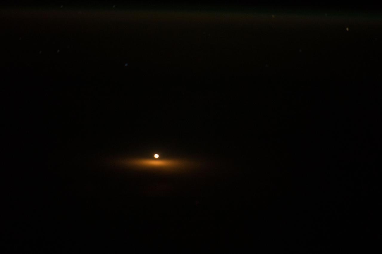 Nighttime view of the launch of the Soyuz TMA-15M spacecraft as seen by Expedition 42 crewmembers aboard the ISS. Image was released by astronaut on Instagram.