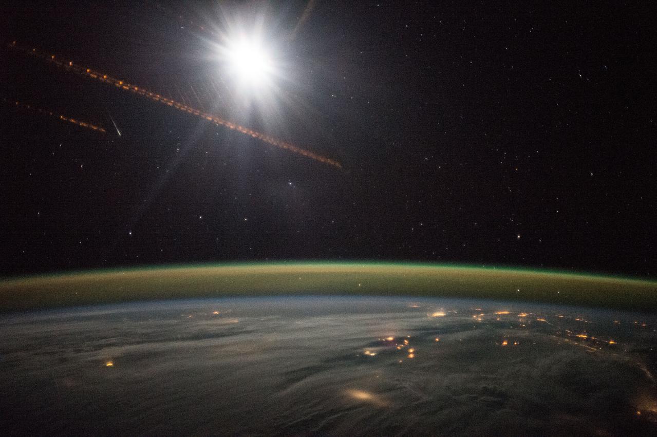 ISS042E037793 (12/13/2014) --- ESA (European Space Station) astronaut Samantha Cristoforetti on board the International Space Station Dec. 13th, 2014 took this night exposure of the Earth showing an Aurora with city lights over the Baltic countries of northern Europe and England.