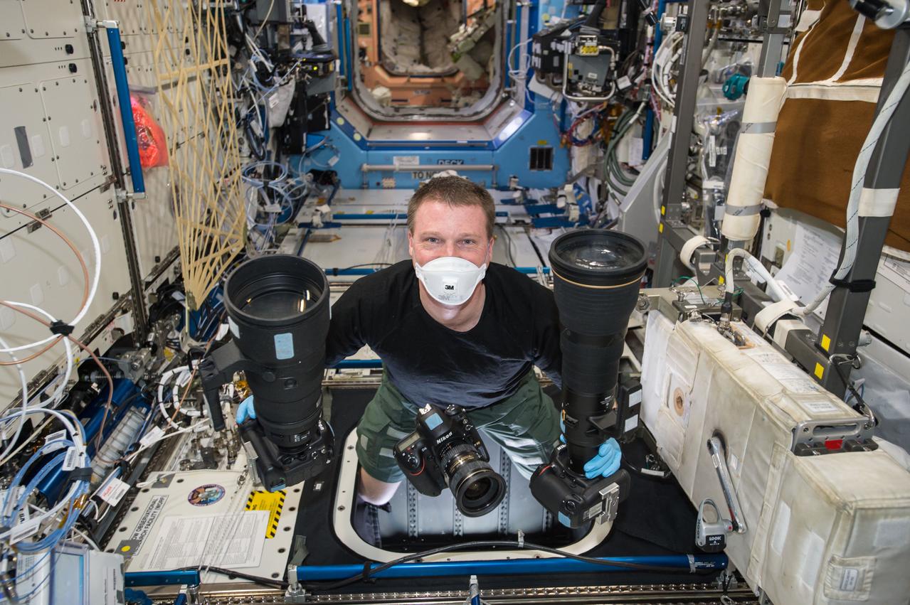 ISS042E119876 (01/10/2015) --- US Astronaut and Flight Engineer Terry Virts a member of Expedition 42 on the International Space Station prepares to take scientific photographs on Jan. 10, 2015.