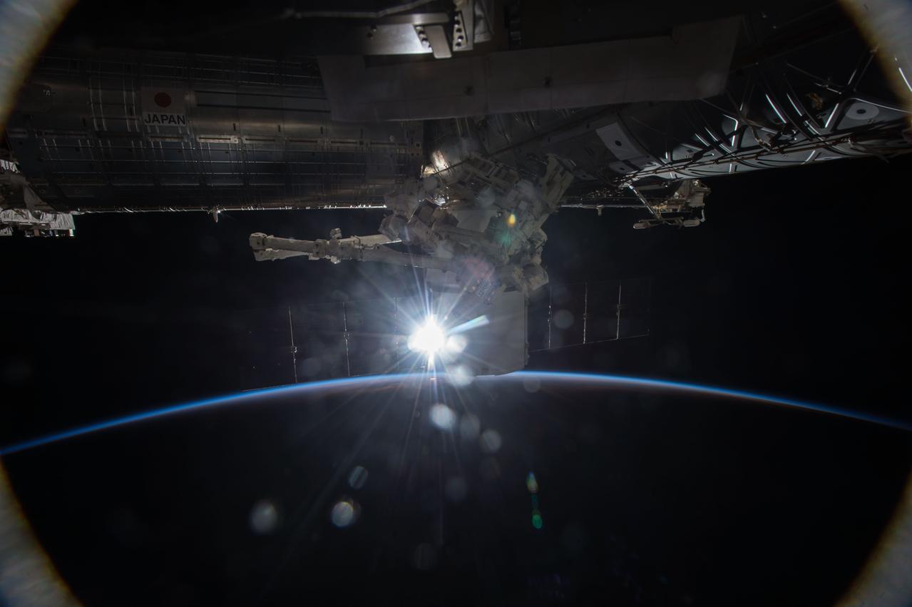 GMT017_17_35_Terry Virts_night shots sunrise dragon reflection in cupola_130B