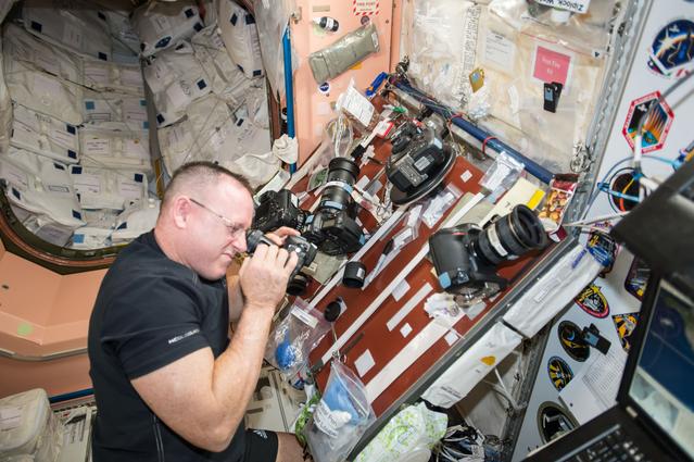 NASA image: IMAX and Nikon Camera Sensor Cleaning