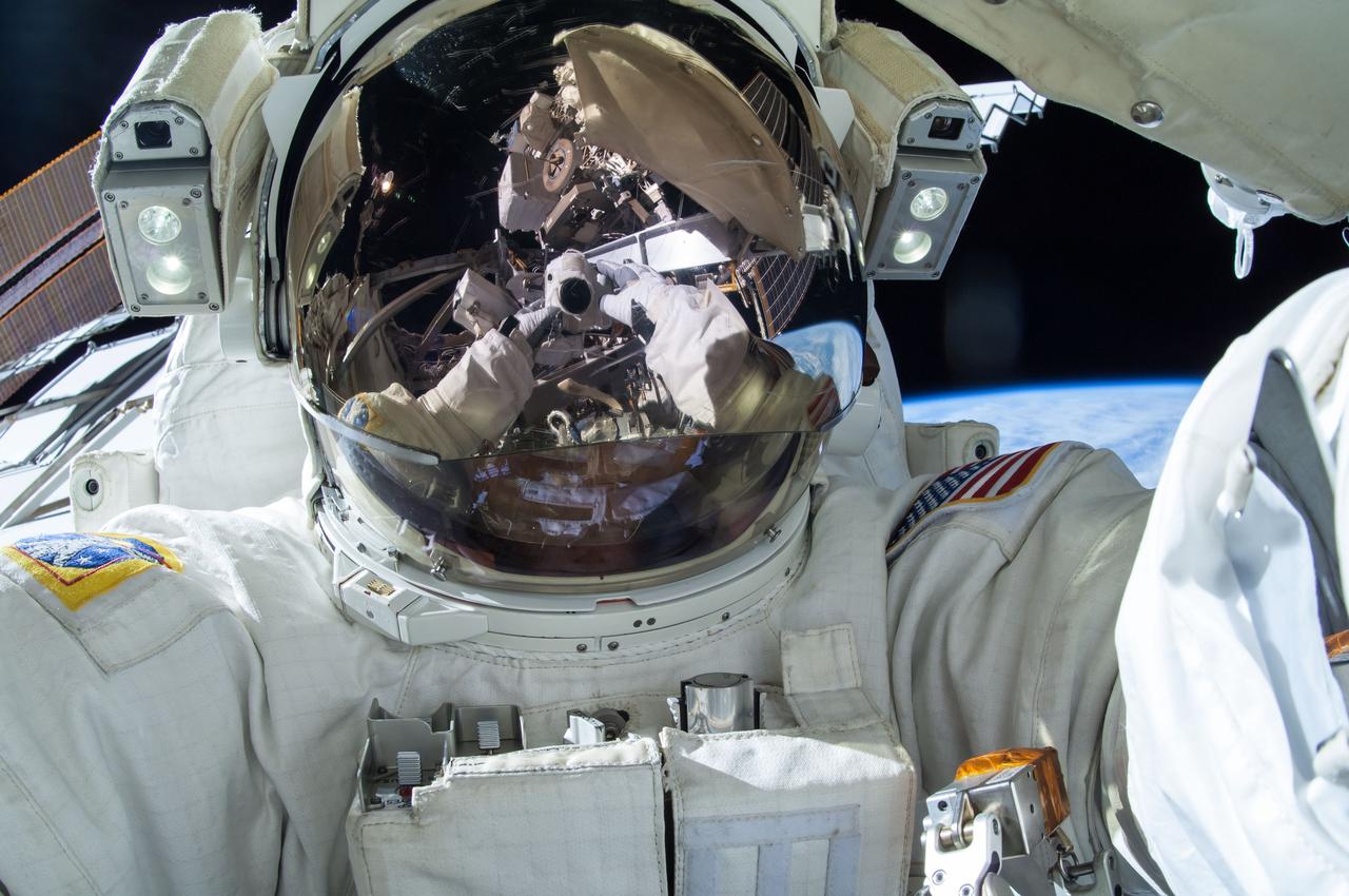 ISS042E292494 (03/01/2015) --- U.S. astronauts Barry "Butch" Wilmore and Terry Virts performed three separate spacewalks to prepare the International Space Station for upcoming U.S. commercial spacecraft currently in development. Virts tweeted this image on March 1, 2015 with the comment "Still thinking about that #awesome #spacewalk yesterday with #AstroButch!"
