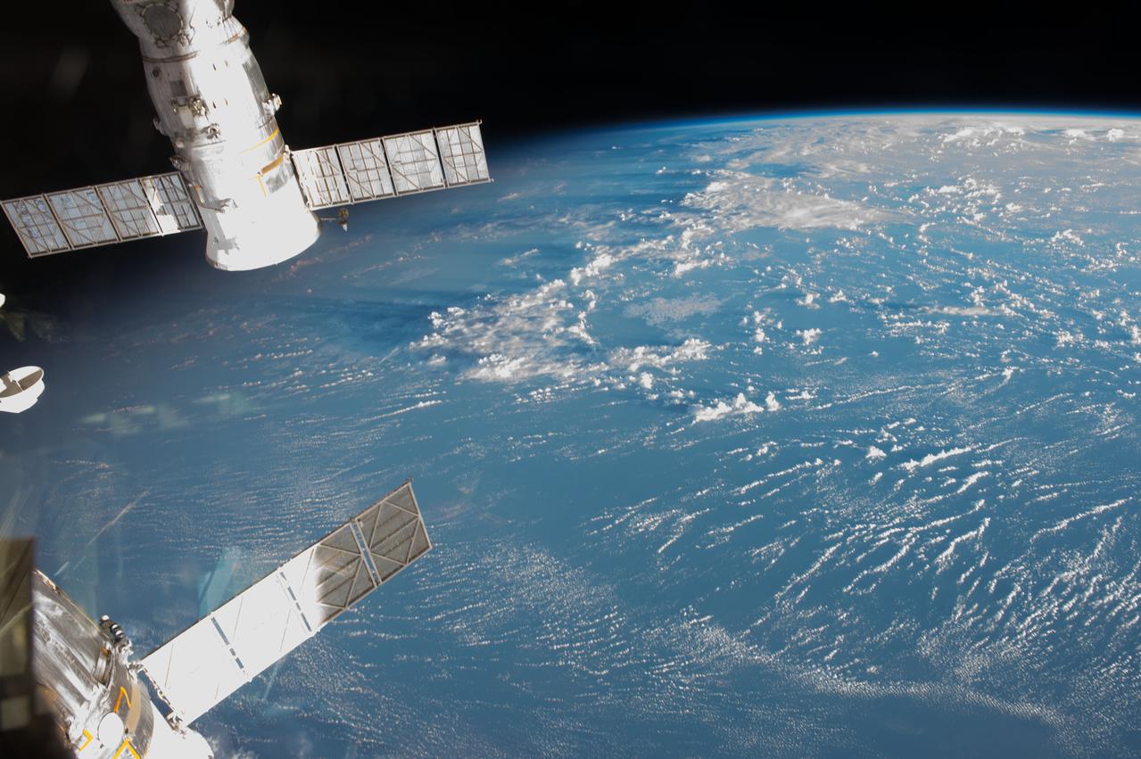 ISS043E080914 (04/01/2015) --- This Earth view from the International Space Station Apr. 1, 2015 (bottom left corner) is Soyuz TMA-15M which carried NASA astronaut Terry Virts, ESA (European Space Agency) astronaut Samantha Cristoforetti and Russian cosmonaut Anton Shkaplerov to the ISS back in No. 2014 and will remain until May 2015. The further one (top left corner) is Progress 57 a Russian supply spaceship which launched and docked in October last year and will undock at the end of April to return to Earth.