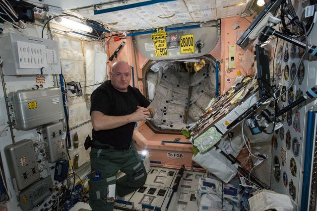 NASA image: Kelly in Node 1 for meal time