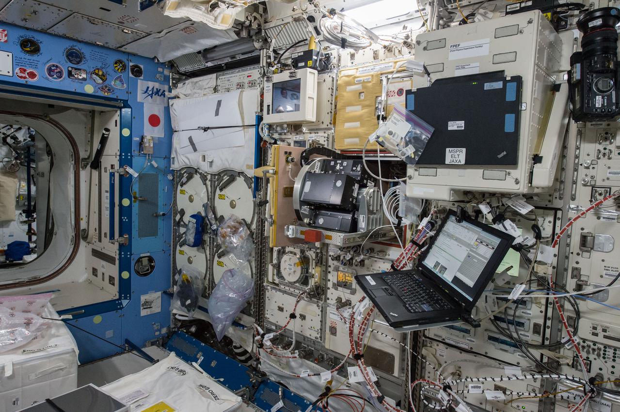 iss043e124204 (4/18/2015) --- A view of the Cell Biology Experiment Facility (CBEF) rack in the Japanese Experiment Module (JEM) aboard the International Space Station (ISS) in preparation for the Space Aging investigation. The purpose of the experiment is to study the effects of weightlessness in space flight on the aging of the C. elegans roundworm, a model organism for a range of biological studies. Microgravity causes a number of physiological changes, like heart and bone deconditioning, involving mechanisms that are poorly understood and may affect the rate at which organisms and astronauts age. The Space Aging experiment will grow millimeter-long C. elegans roundworms in microgravity and compare their health and longevity with controlled specimens on Earth.