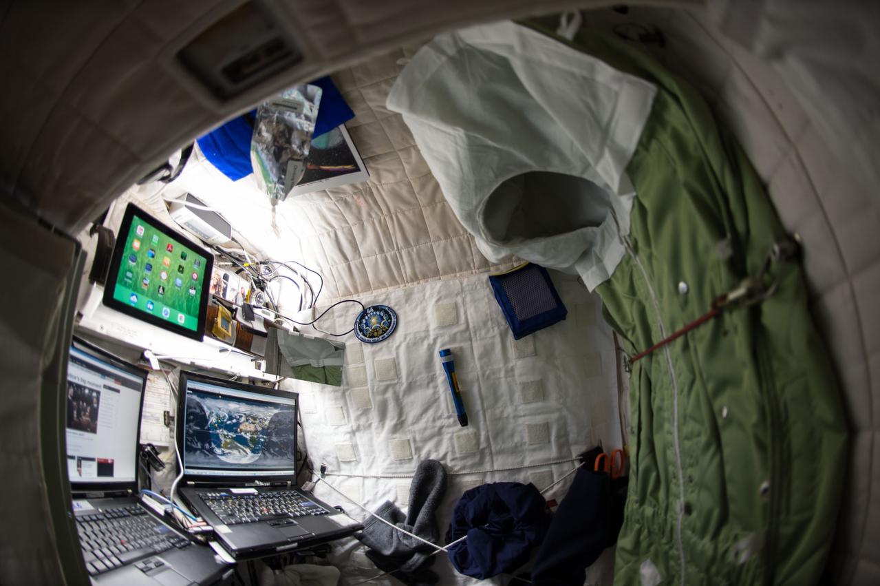 ISS043E137178 (04/24/2015) --- NASA astronaut Scott Kelly on the International Space Station shows off his personal living quarters in space. Scott tweeted this image out with the comment: " My #bedroom aboard #ISS. All the comforts of #home. Well, most of them. #YearInSpace".