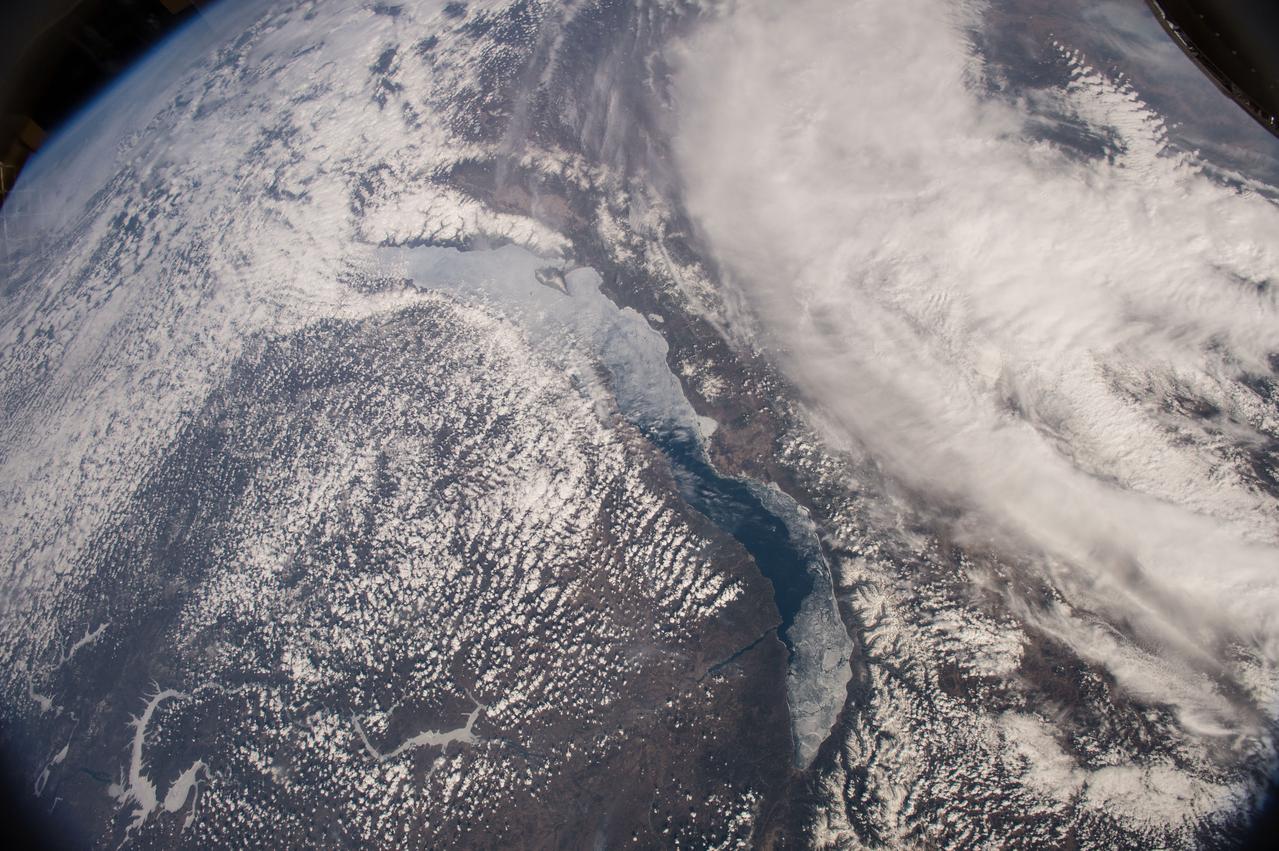 ISS043E142265 (04/26/2015) --- NASA astronaut Scott Kelly on the International Space Station Apr.26, 2015 tweeted this image out of an Earth observation as part of his Space Geo contest "name this location" with this remark and clue: "This frozen body of water is the world's oldest (25 million years) and deepest basin on Earth. Name it!"