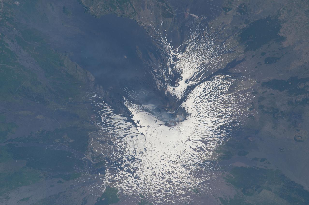 ISS043182340 (05/08/2015) --- NASA astronaut Scott Kelly took this intriguing picture of Mount Etna, a volcano on the Italian island of Sicily. Located on the northeast part of the island it first erupted 500,000 years ago and is still active today. Scott tweeded this image from the International Space Station with the comment: "MtEtna Highest European active #volcano lives up to its Italian name Mongibello (beautiful mountain) from space too".