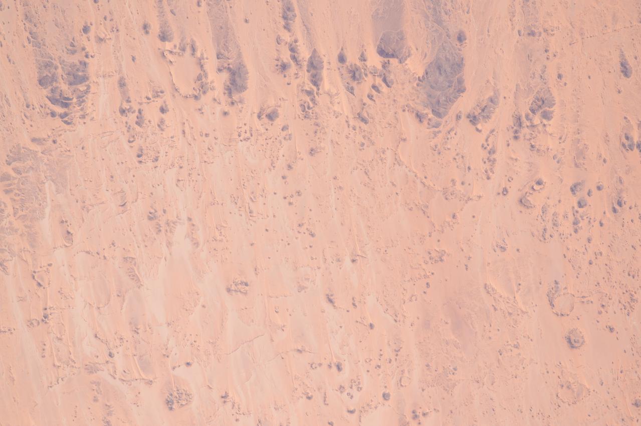 ISS043E182407 (05/08/2015) --- Shades of beige dominate this image of the Libyan Desert and southwestern Egypt scene captured by NASA astronaut Scott Kelly aboard the international Space Station on May, 8th, 2015.