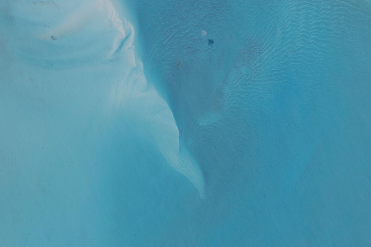 ISS043E187300 (05/10/2015) --- NASA astronaut Scott Kelly tweeted this aquamarine seascape Earth observation on May 10, 2015 from the International Space Station. His comment was a simple: "watercolor from space. #YearInSpace".