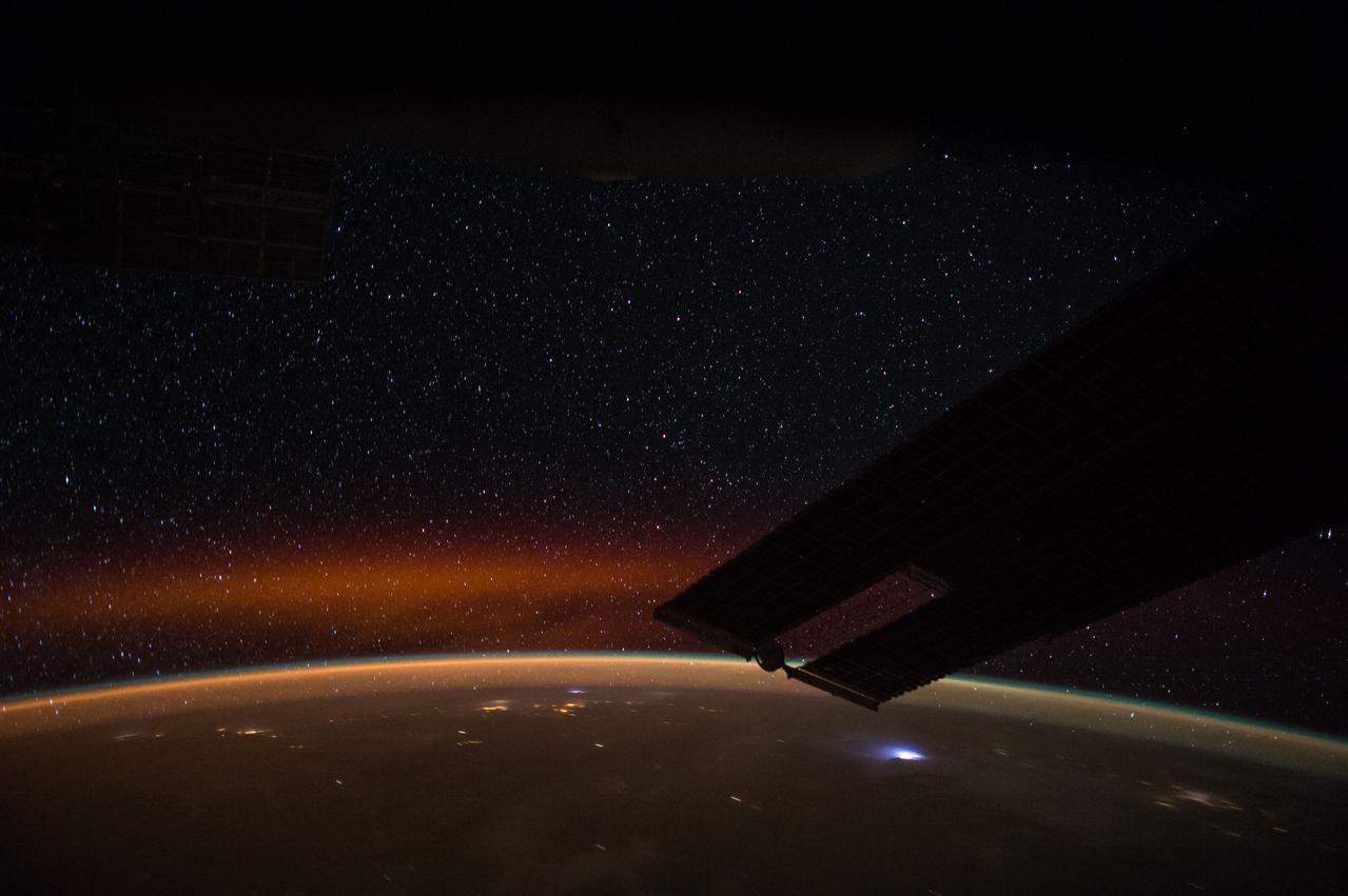 ISS043E193686 (05/14/2015) --- NASA astronaut Terry Virts commander of Expedition 43 on the International Space Station tweeted this night Earth observation with the comment: "This reddish brownish layer of our atmosphere is facinating- it's made of O and OH and is only seen in certain areas".