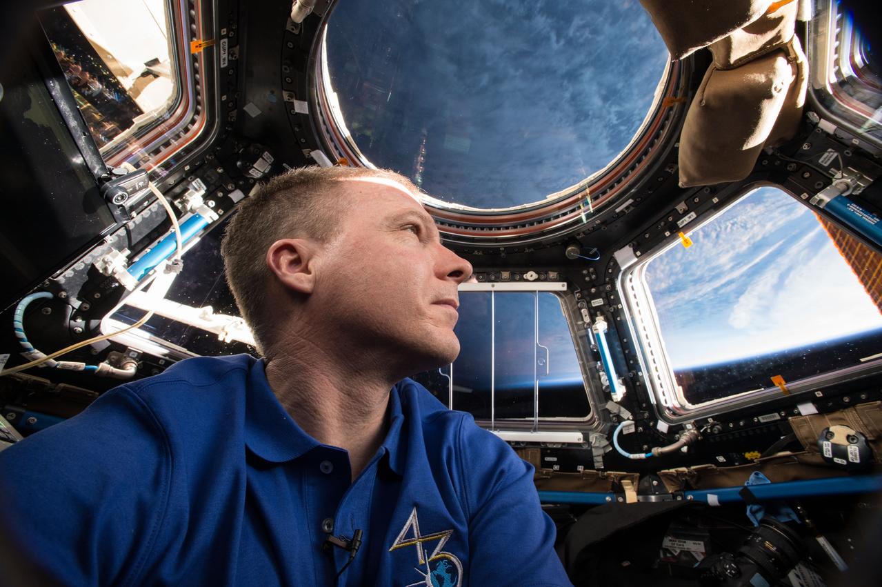 ISS043E241729 (05/24/2015) --- Expedition 43 commander and NASA astronaut Terry Virts is seen here inside of the station’s Cupola module. The Cupola is designed for the observation of operations outside the ISS such as robotic activities, the approach of vehicles, and spacewalks. It also provides spectacular views of Earth and celestial objects for use in astronaut observation experiments. It houses the robotic workstation that controls the space station’s robotic arm and can accommodate two crewmembers simultaneously.