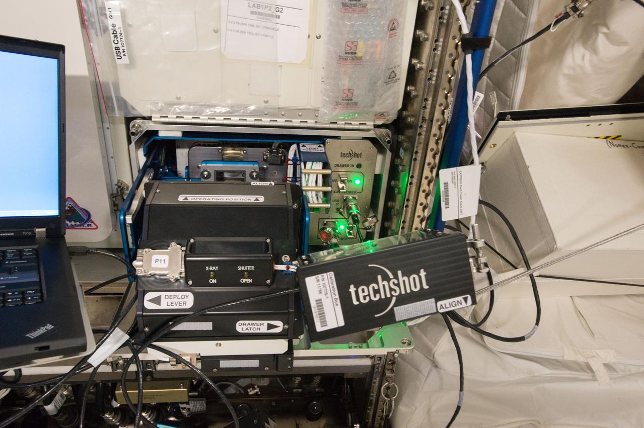 iss043e286992 (6/6/2015) --- Photographic documentation of the Bone Densitometer Validation experiment in support of Rodent Research 2 (RR2) experiment. Bone Densitometer Hardware Validation (Bone Densitometer Validation) tests an X-ray device the size of a kitchen microwave oven, which measures bone density, muscle and fat in mice living on the International Space Station.