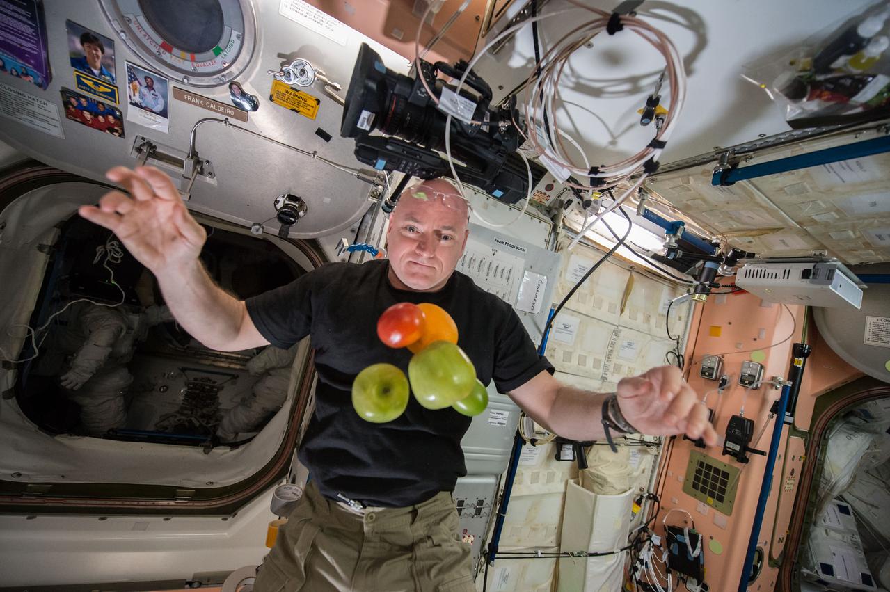 ISS044E007995 (07/05/2015) ---NASA astronaut Scott Kelly in the Unity (Node 1) module enjoying some fresh fruit and vegetables brought up to the International Space Station by the recent Russian Progress 60 spacecraft.
