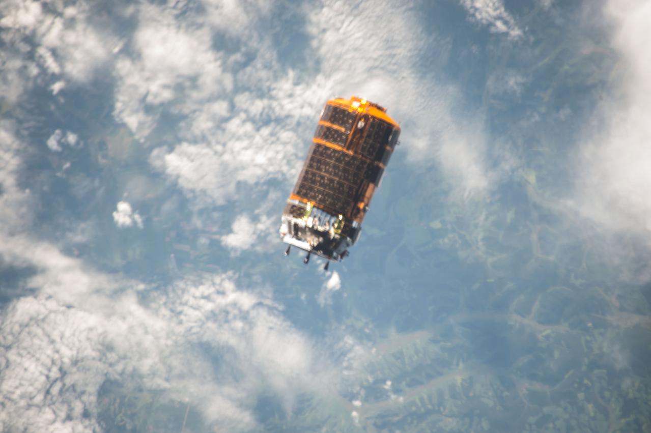 ISS044E060990 (08/24/2015) --- The Japan Aerospace Exploration Agency (JAXA) Kounotori 5 H-II Transfer Vehicle (HTV-5) is seen during final approach towards the International Space Station. The unpiloted cargo craft, named “Kounotori,” which is Japanese for “white stork,” is loaded with more than four-and-a-half tons of research and supplies, including water, spare parts and experiment hardware