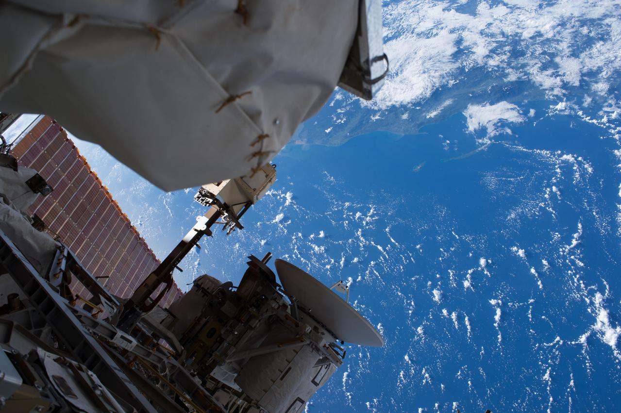 Close-up view of the Alpha Magnetic Spectrometer-02 (AMS-02), in the area where the Tracker Thermal Control System (TTCS) wedge will be installed. Image was taken by Extravehicular Crewmember 2 (EV2) during Extravehicular Activity 32 (EVA 32) and released on social media.