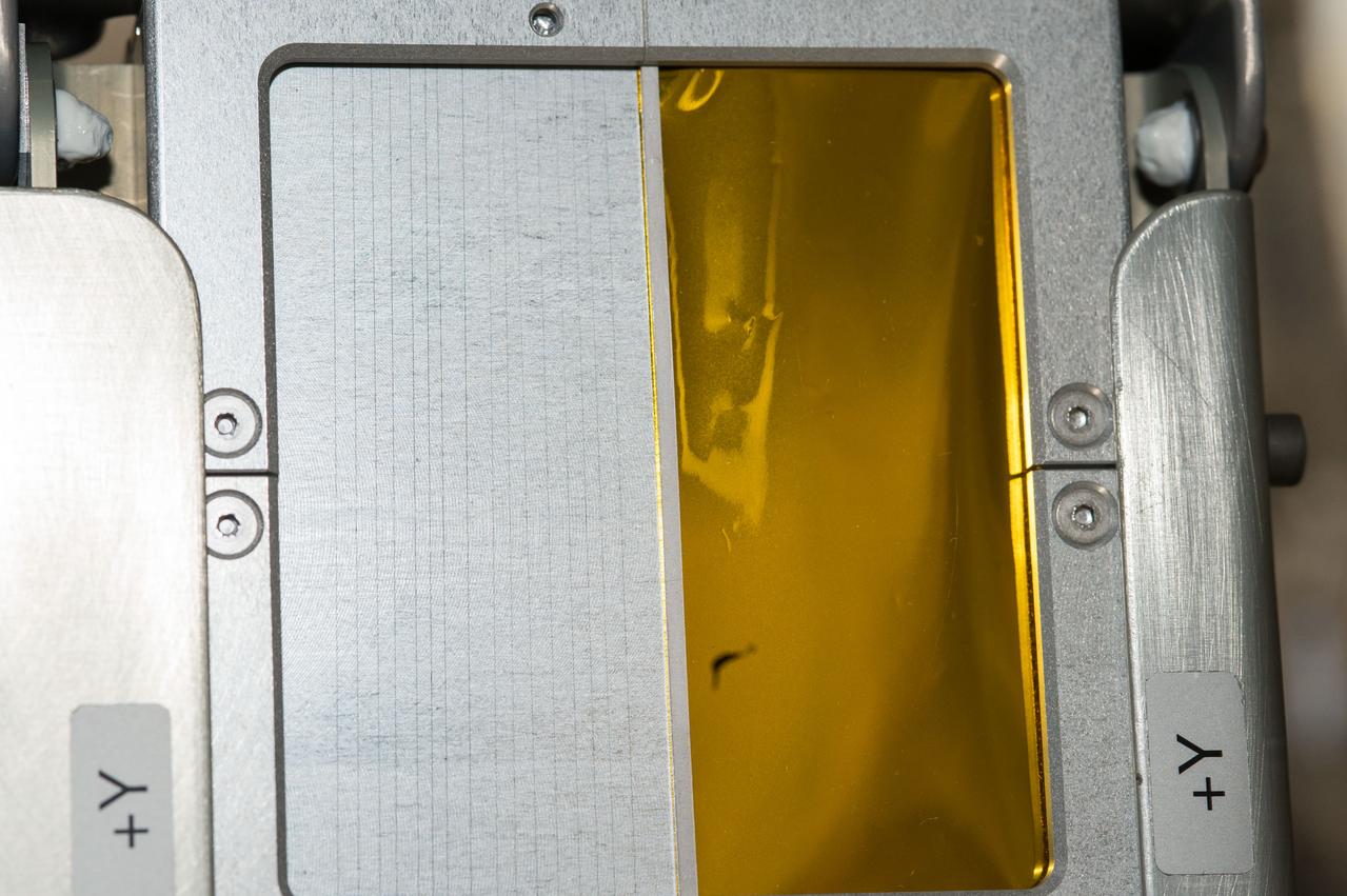 iss045e083367 (10/30/2015) --- Photo documentation of the Carbon Nanotube sample attached to the V position on the Handhold Experiment Platform (HXP) for ExHAM-MDM2 experiment operations aboard the International Space Station (ISS). Space Environment Exposure Experiment of CNT Material for Space Application (Carbon Nanotube) tests an advanced carbon-based material for its ability to withstand the withering radiation of space.