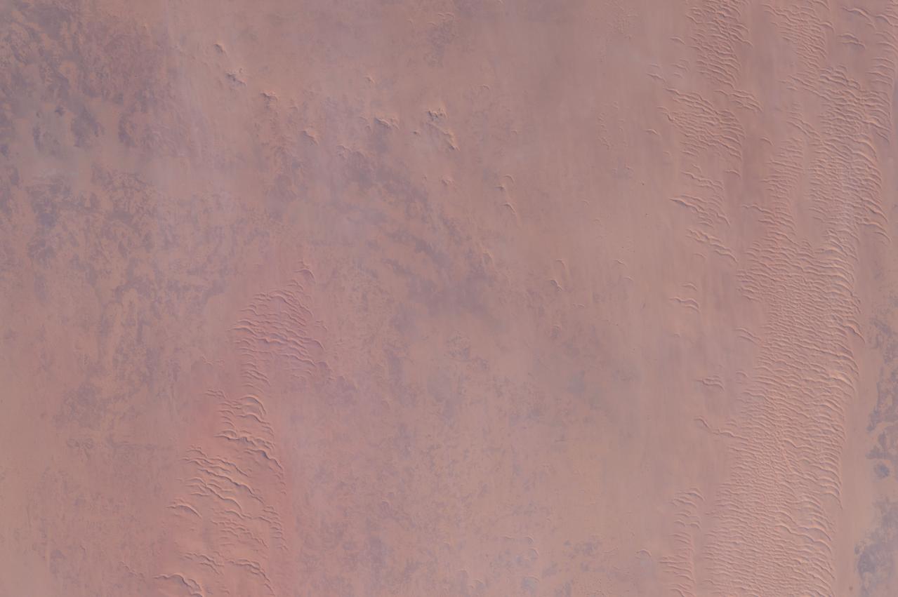 ISS046e004756 (01/04/2016) --- NASA astronaut Scott Kelly captured this beige desert image as the International Space Station passed over Africa. He tweeted out this message: " I can always count on #Africa for colorful #EarthArt. #YearInSpace".