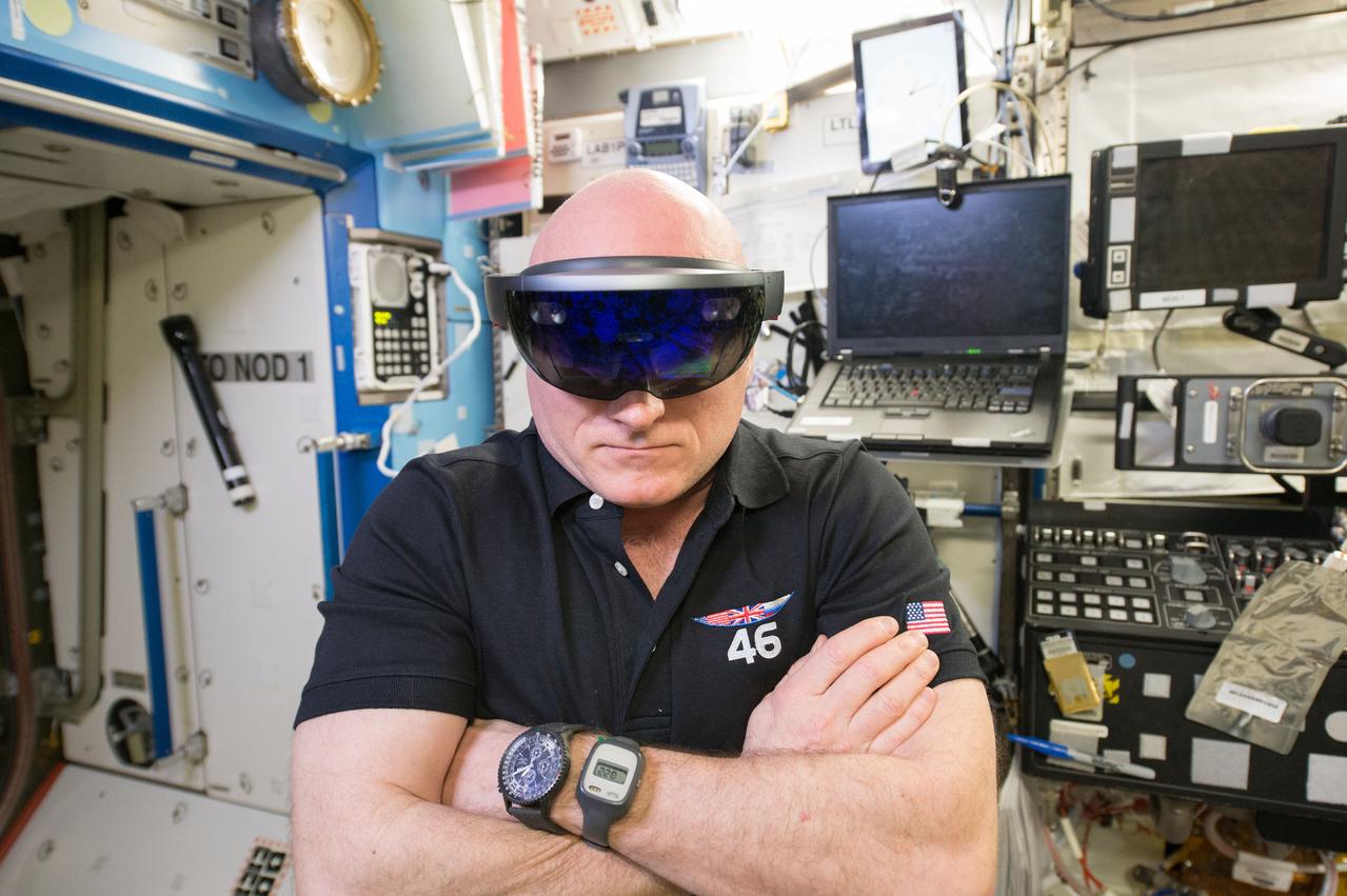 ISS046e043637 (02/20/2016) --- NASA astronaut Scott Kelly tweeted out this image to his followers Feb 20, 2016 with the tag: "This #Saturday morning checked out the @Microsoft #HoloLens aboard @Space_Station! Wow! #YearInSpace ". The device is part of NASA’s project Sidekick which is exploring the use of augmented reality to reduce crew training requirements and increase the efficiency at which astronauts can work in space.