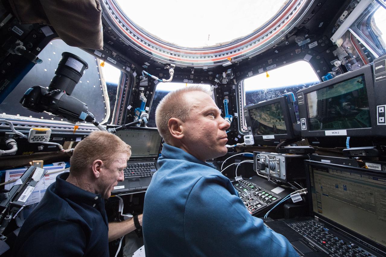 ISS047e021582 (03/26/2016) --- Cygnus capture on 26 March 2016. Expedition 47 robotic arm operator NASA astronaut Tim Kopra of NASA commanded the International Space Station’s Canadarm2 robotic arm to capture and dock the Cygnus spacecraft. He was assisted by ESA (European Space Agency) astronaut Tim Peake.