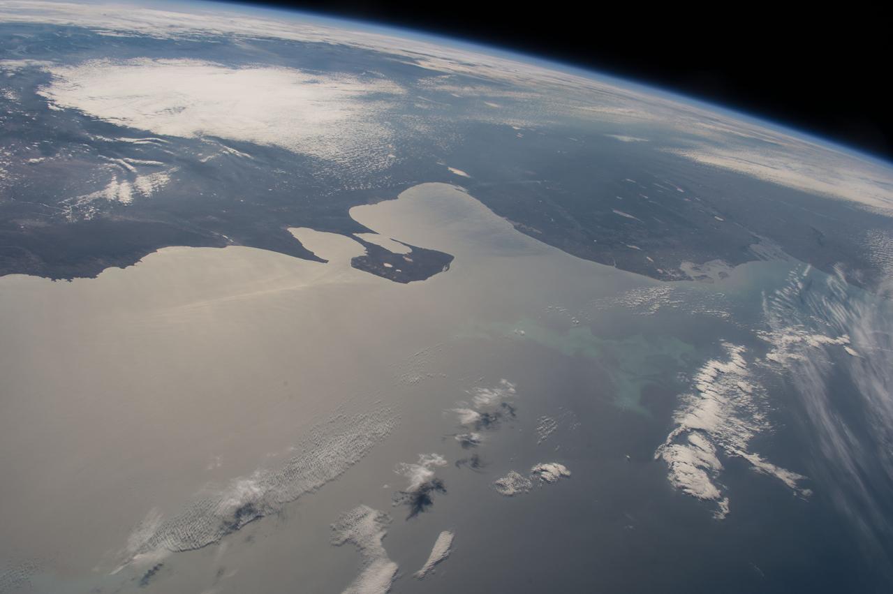 ISS047e023224 (03/26/2016) ---The view of the Earth from the vantage point offered from the International Space Station is constantly changing as the station orbits around at 17,500 miles an hour. This image is of the  Argentinian coastline. The Valdes Peninsula is the piece of land jutting out near the middle of the picture.