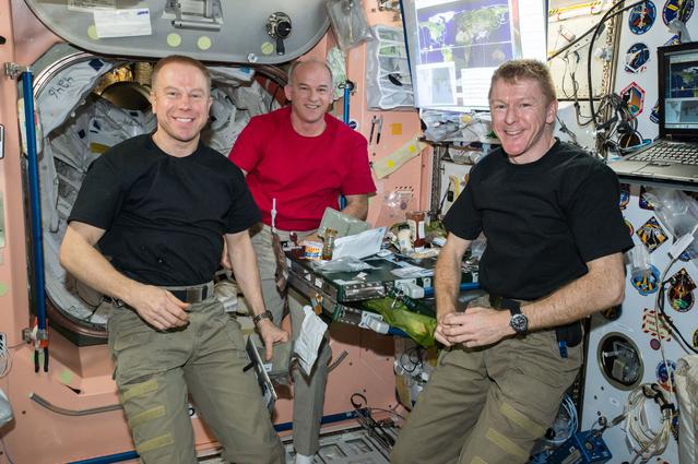NASA image: Expedition 47 Crewmembers during Meal