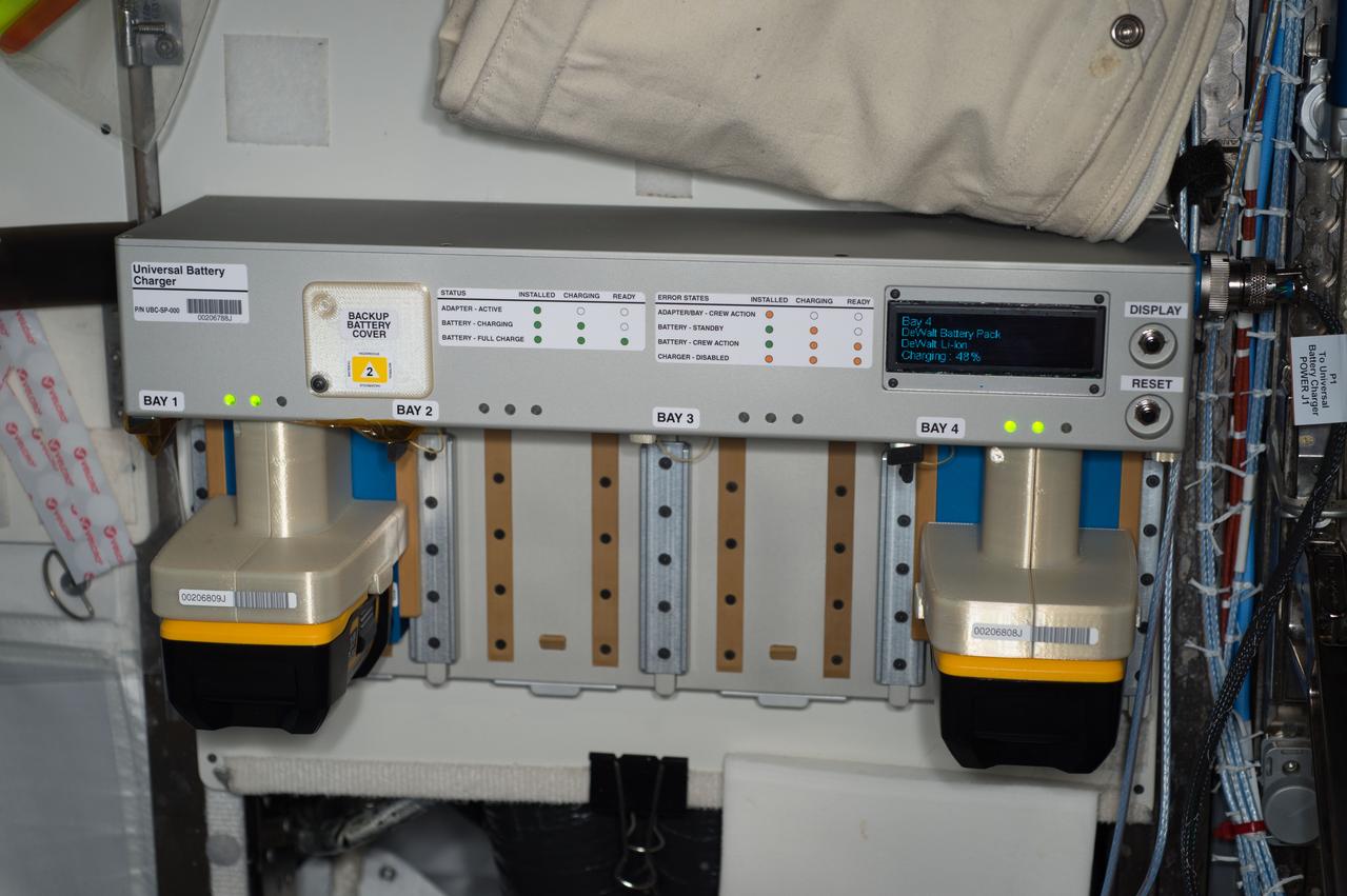 iss047e057658 (4/14/2016) --- Photo documentation during the installation of Universal Battery Charger (UBC), in the U.S. Laboratory aboard the International Space Station (ISS). The Universal Battery Charger provides a new, transformable system to charge different types of batteries aboard the International Space Station (ISS). The ability to charge multiple battery types with one system reduces the amount of cargo that must fly to the station and be stowed on board.