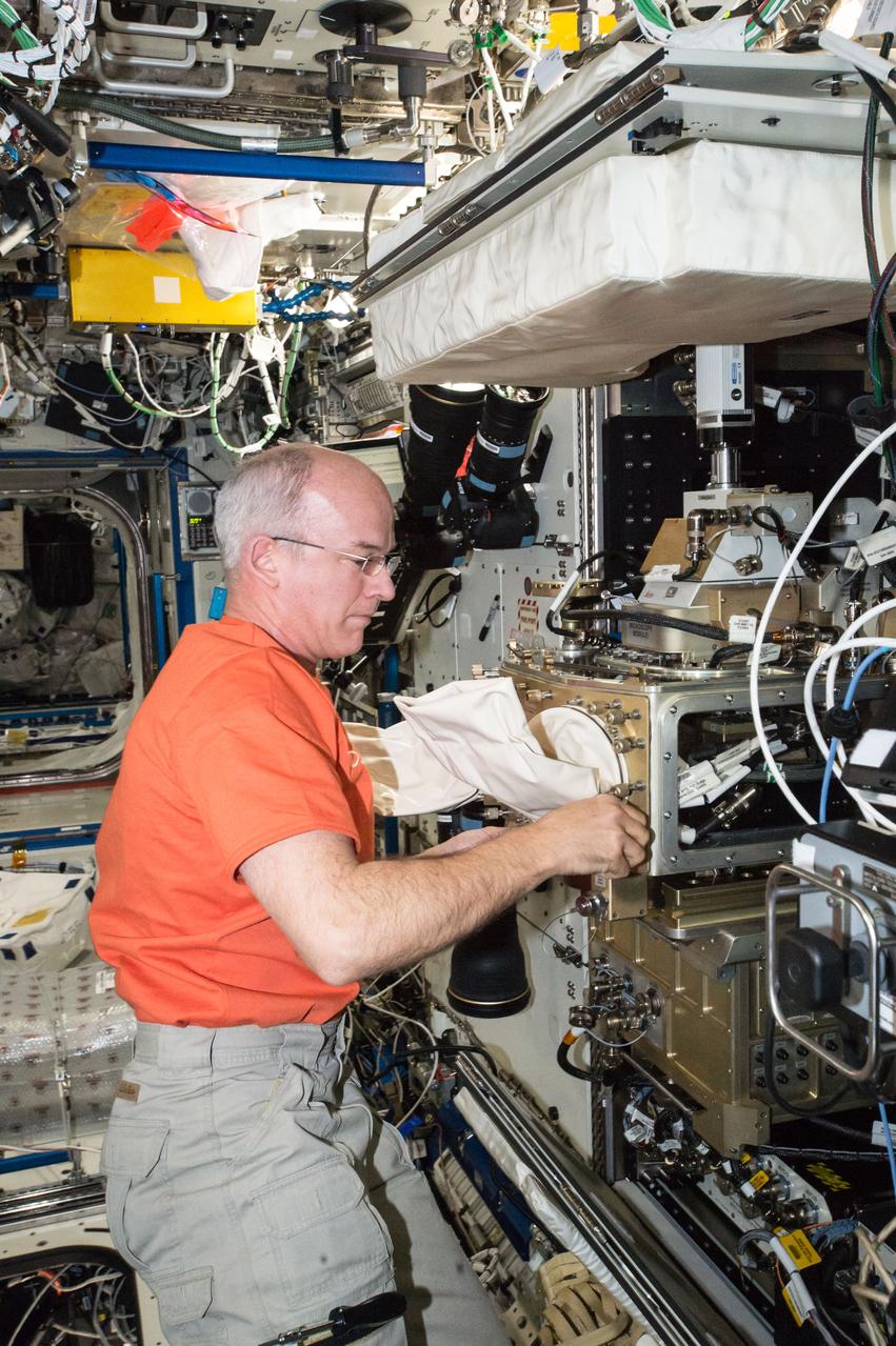 ISS047e066551 (04/18/2016) --- NASA astronaut Jeff Williams configures the station’s Light Microscopy Module (LMM), a modified commercial, highly flexible, state-of-the-art light imaging microscope facility that provides researchers with powerful diagnostic hardware and software. The LMM enables novel research of microscopic phenomena in microgravity, with the capability of remotely acquiring and downloading digital images and videos across many levels of magnification.