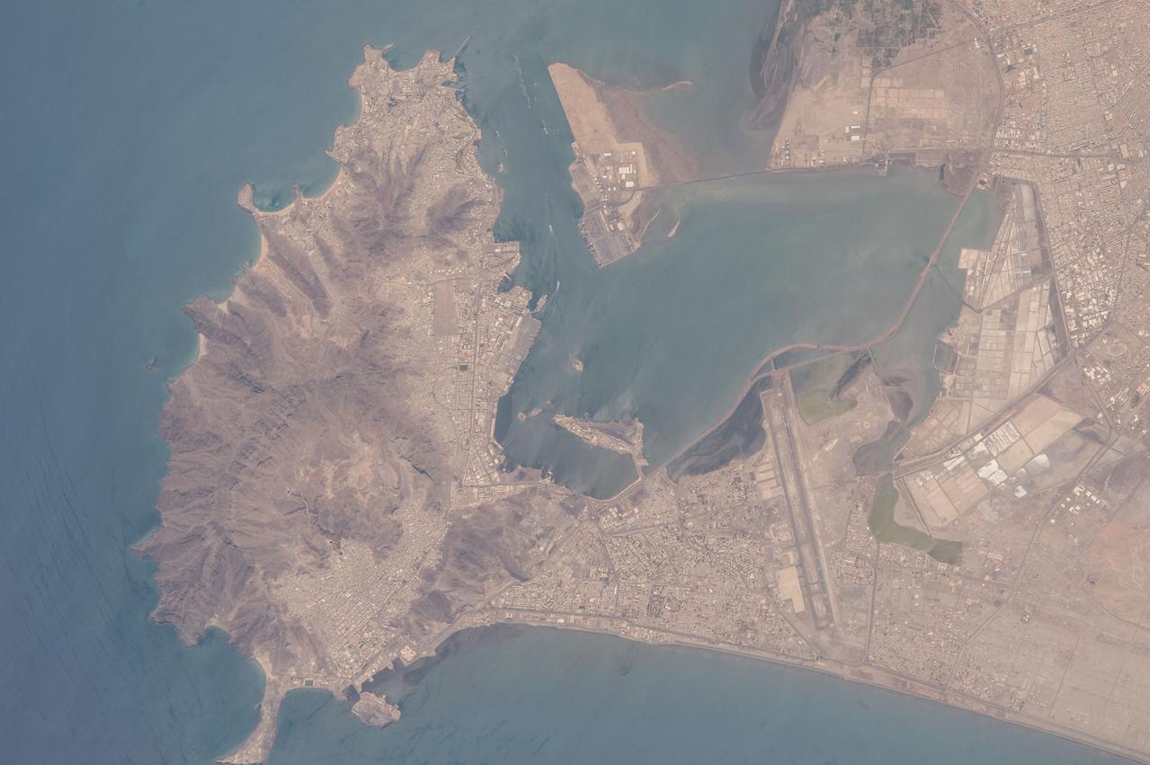 ISS047e111682 (05/09/2016) --- This Image from the International Space Station is of the middle eastern country of Yemen and its ancient port of Aden located by the eastern approach to the Red Sea. Aden's ancient, natural harbor lies in the crater of a dormant volcano which now forms a peninsula, joined to the mainland by a low isthmus.