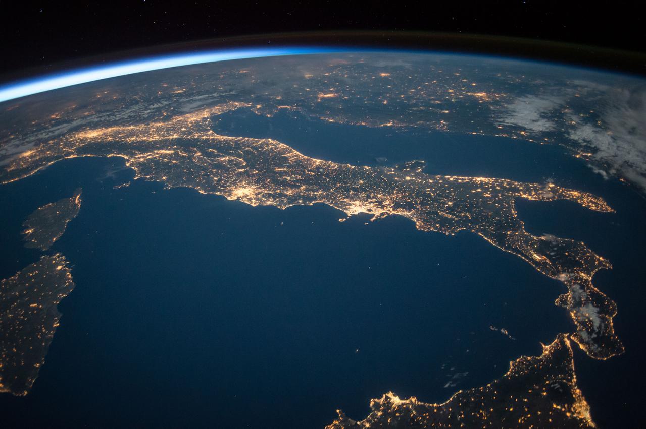 ISS047e125942 (05/21/2016) --- The familiar "boot" shape of the county of Italy stands out in this nighttime image with sparkling city lights reaching from Sicily off the "toe" of the boot, to the approaches to the Alps on the north end of the country.