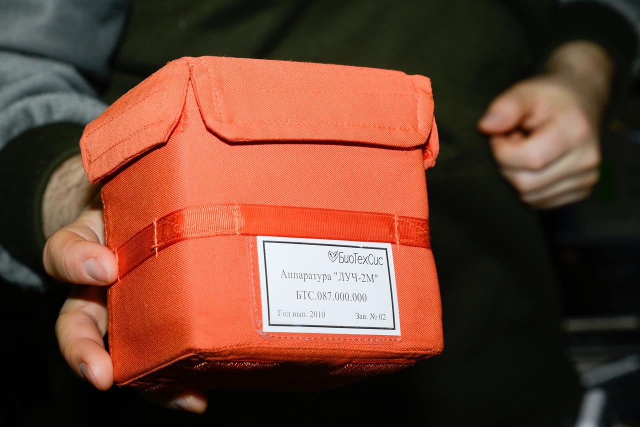 iss047e154711 (6/17/2016) --- Photographic documentation of Luch-2M Multipurpose Crystallization Cassette (УБК) within orange case. Struktura is a study of protein crystallization processes and growth of single crystals which are suitable for X-ray structural analysis and structural decoding.