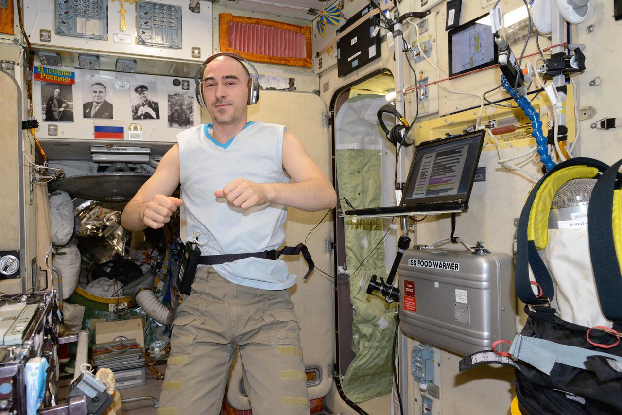 iss048e049904 (8/8/2016) --- Roscosmos cosmonaut Anatoly Ivanishin is photographed during Splanh (Splankh) experiment operations (OPS) in the Zvezda Service Module (SM) aboard the International Space Station (ISS).